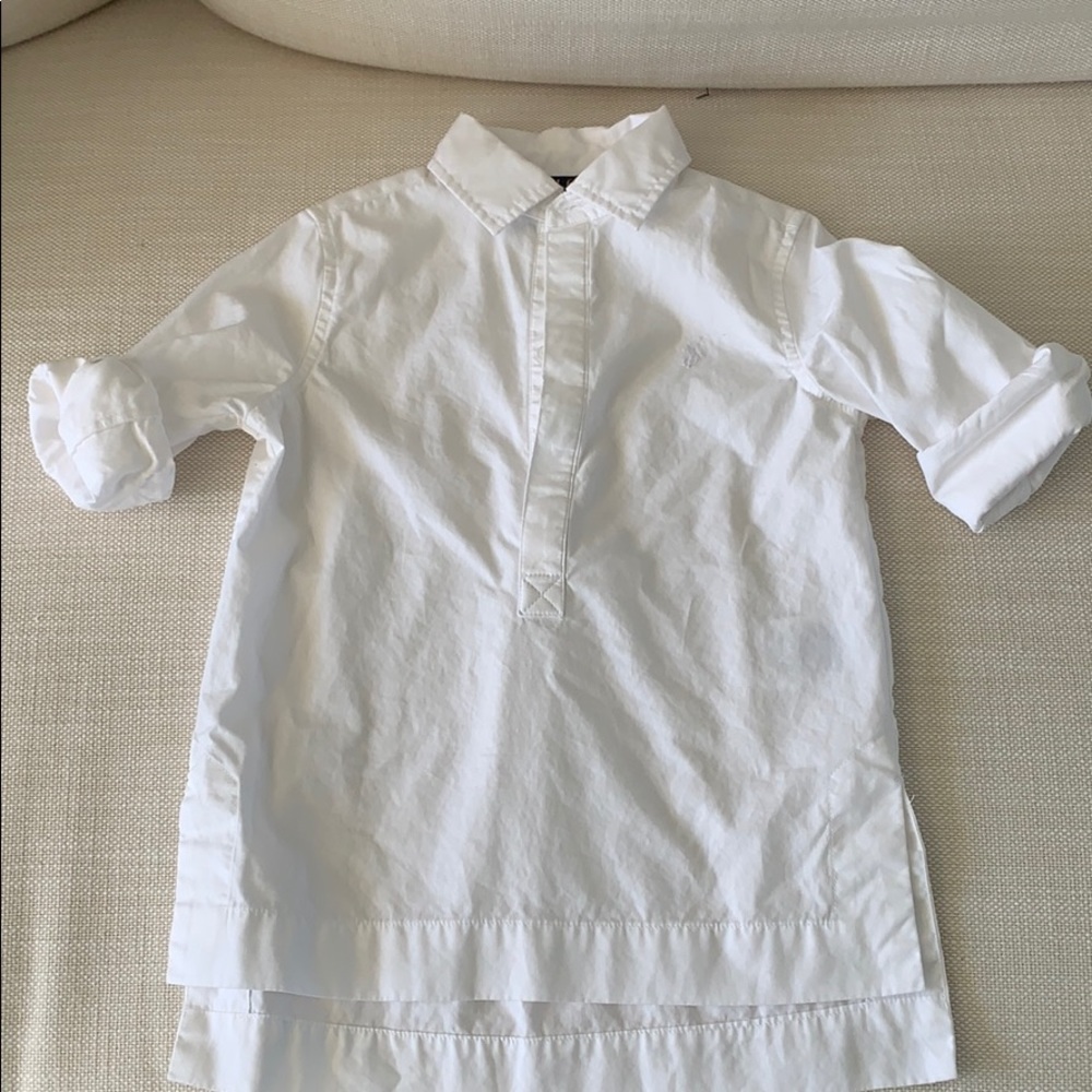 White polo 3/4 button down. Long sleeves.